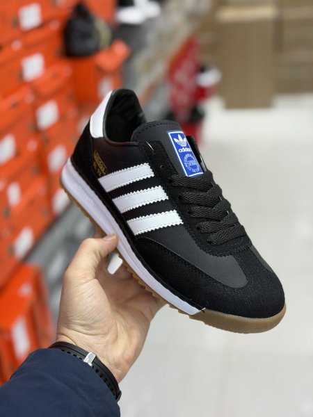 اديدس / اسود / ابيض / sl 72